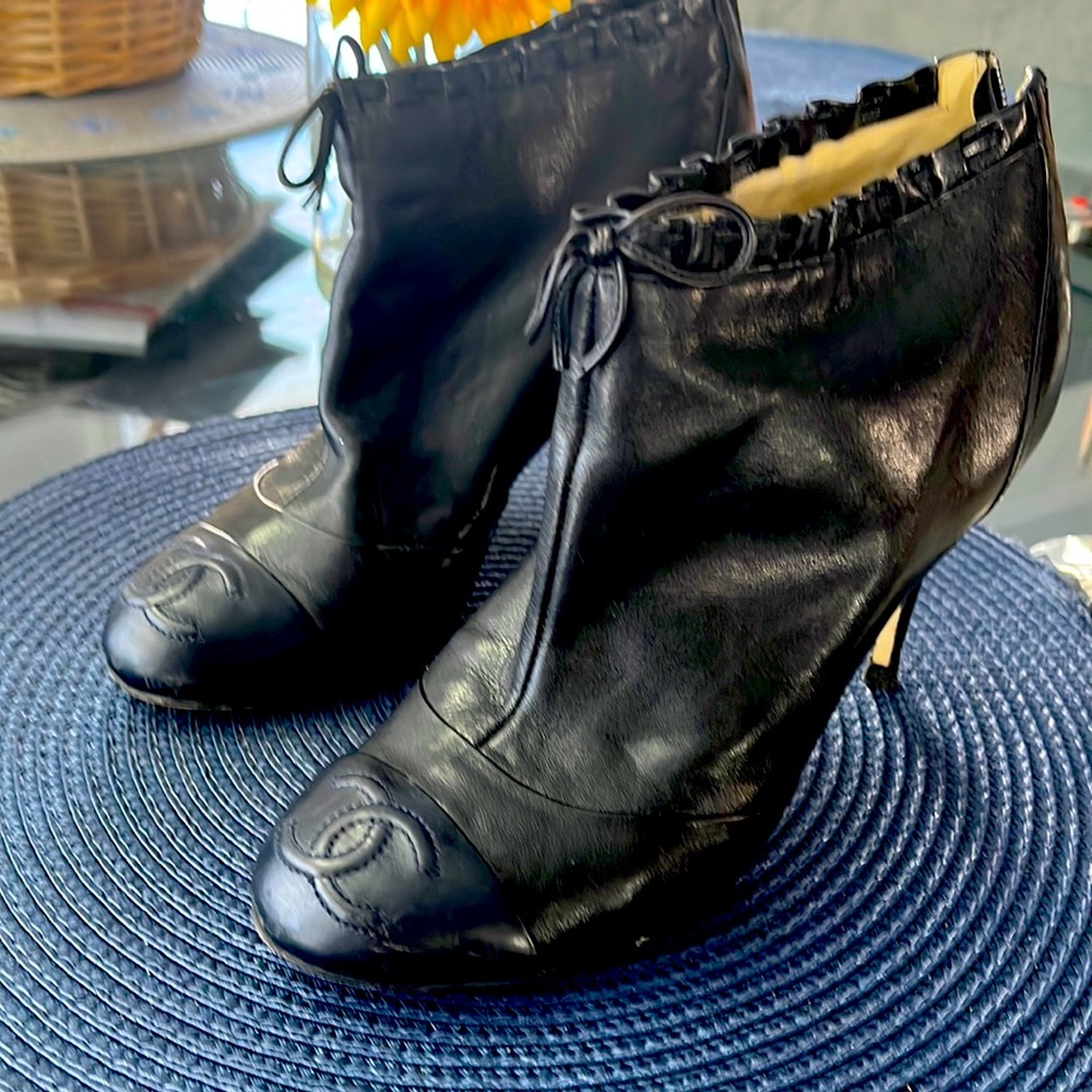 Chanel booties … cleaning out my closet.  Size 38. Great condition